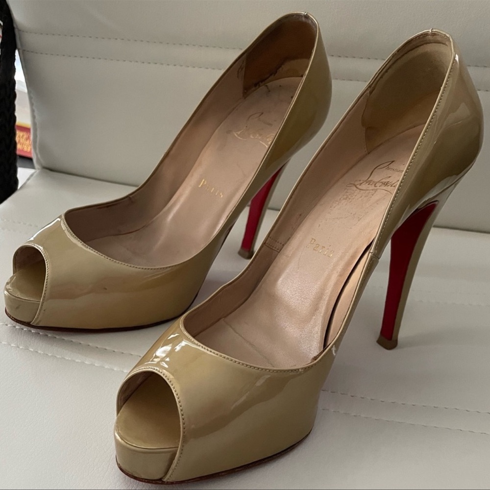 Christian Louboutins Gold Peep Toe Heels